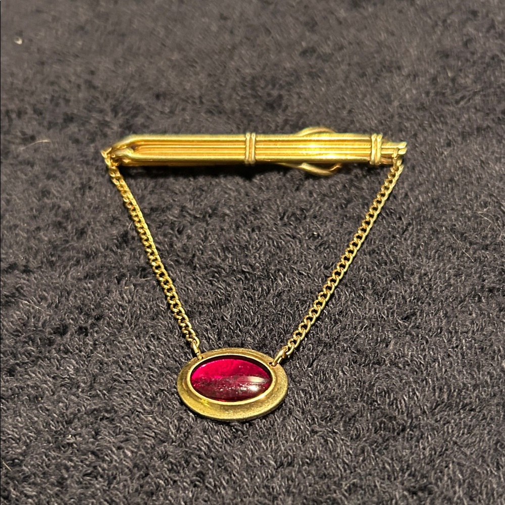 Tie Bar with Ruby Red Stone on Gold Tone Bar